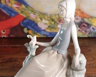 Lladro 4660 Shepherdess Girl w/ Dove Porcelain Figurine	6.5 inches high.