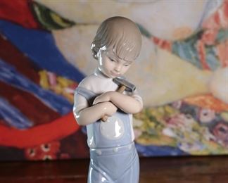 Lladro 4897 Mechanic Boy with Hammer & Toy Truck Porcelain Figurine	8.25 inches high.	