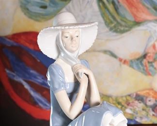 NAO By Lladro 0229 Girl with Straw Hat Porcelain Figurine	11.25 inches high.	