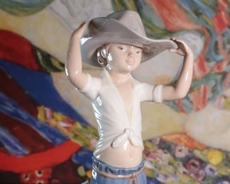 NAO By Lladro 0182 Young Cowboy Porcelain Figurine	10.5 inches high.	