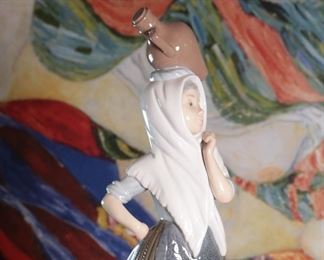 NAO by Lladro 7381 The Water Carrier Girl Porcelain Figurine	12.5 inches high.	