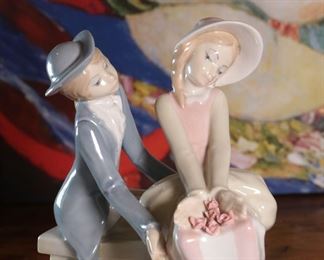 D'Art SA Boy and Girl on Bench&nbsp;Porcelain Figurine	7.75 inches high.	