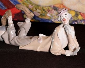 Lladro 4618 Clown Reclining Lying Down With Beach Ball Porcelain Figurine	6.5 inches high.	

