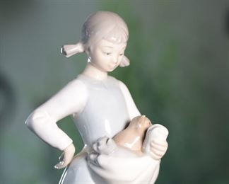 NAO by Lladro Girl with Kittens Porcelain Figurine	9 inches high	
