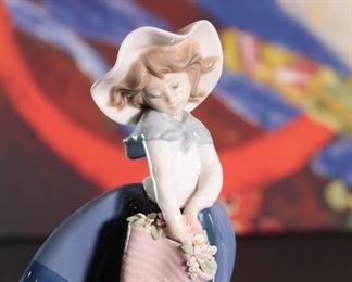 Lladro 5222 Pretty Pickings Girl with Flower Basket Porcelain Figurine	7.25 inches high.	
