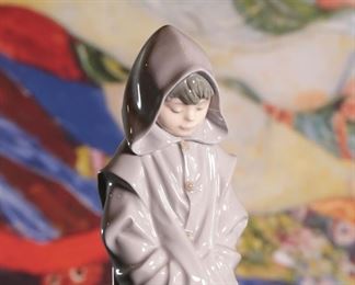 NAO by Lladro Boy Hooded Clock with Dog Porcelain Figurine	10.5 in H 	
