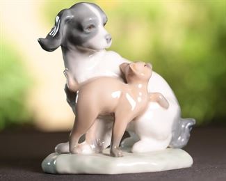NAO Spaniel & Cat Porcelain Figurine	4.75 inches high.	

