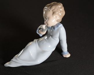 Lladro 5099 Baby with Pacifier Porcelain Figurine	4.5 inches high.	
