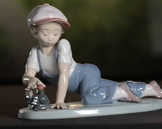 Lladro 7619 All Aboard Boy With Train Porcelain Figurine	5 inches high	
