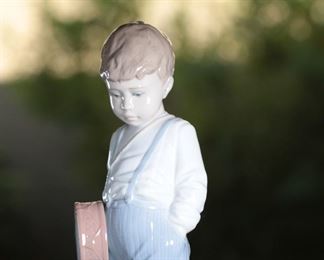 Lladro 6846 Friendly Duet Boy Dog Porcelain Figurine	9.75 inches high.	
