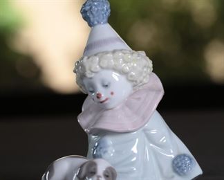 Lladro 5277 Pierrot Clown with Puppy Dog on Lap Porcelain Figurine  	4.5 inches high.	
