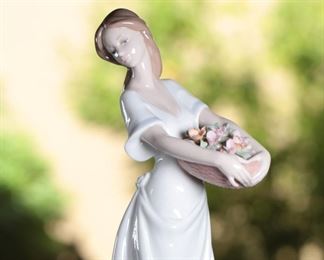 Lladro 7704 Garden of Athens Lady with Flower Basket Porcelain Figurine	10.25 inches high	
