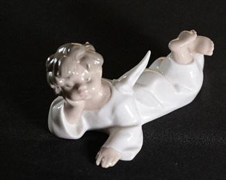 Lladro 4541 Angel Laying Down Porcelain Figurine 	3 inches high 	
