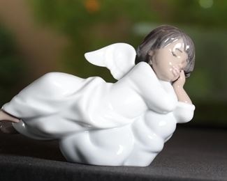 Lladro 6491 Heavenly Dreamer Porcelain Figurine	3.5 inches high.	
