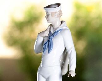 NAO by Lladro 429 A Long Voyage Sailor Porcelain Figurine	7.25 inches on.	
