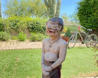 Primitive Carved Wood Figural Statue	30 inches high	
