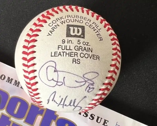 Signed sports illistrated Magazine & Ball		
