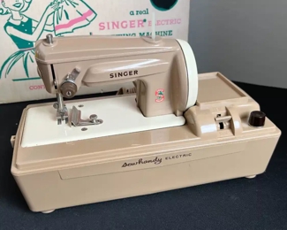 Vintage 1950's Singer Sewhandy Sewing Machine Model 50 Toy	Box: 10.5 x 13.5 x 7.in	HxWxD
