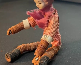 Antique Stacked Leather Doll Figure 	7in Long	
