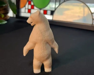 Alaskan Carved Polar Bear Sculpture	5.5x3.5x1.5in	HxWxD
