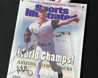 Signed sports illistrated Magazine & Ball		
