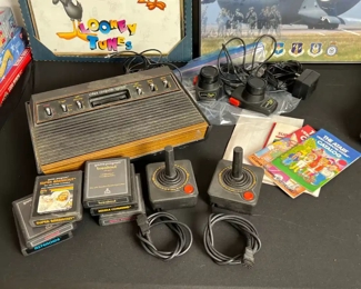Vintage Atari system with Games		
