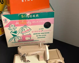 Vintage 1950's Singer Sewhandy Sewing Machine Model 50 Toy	Box: 10.5 x 13.5 x 7.in	HxWxD
