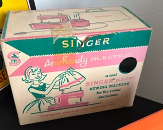 Vintage 1950's Singer Sewhandy Sewing Machine Model 50 Toy	Box: 10.5 x 13.5 x 7.in	HxWxD
