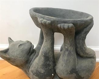 Heavy sculpture of a cat.