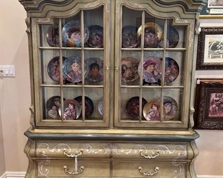Drexel French Country cabinet with silver storage. Beautiful collection of Edna Hibel numbered plates. 