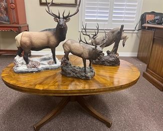 Coffee table, signed elk sculptures 