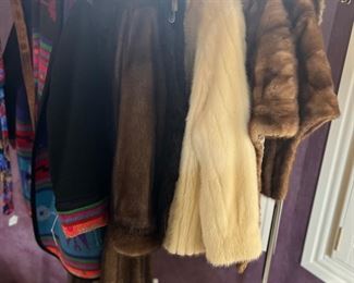 Several beautiful furs in different lengths
