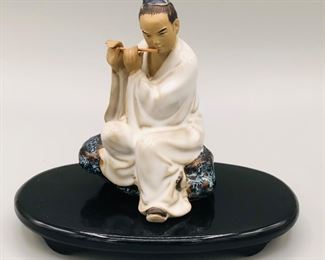 China Shiwan Scholar Playing With Flute