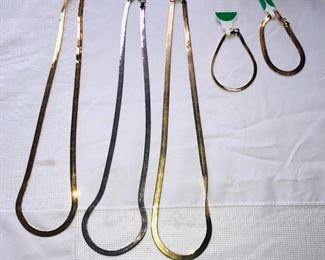 Gold and silver serpentine necklaces and bracelets