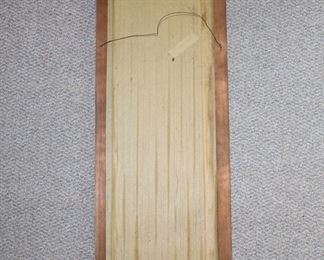 Reverse of framed copper art