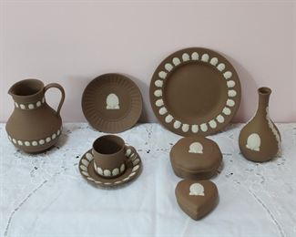 Wedgwood brown jasperware in the shell pattern including covered boxes