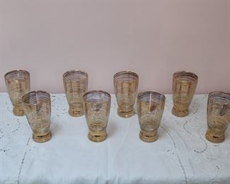 Set of eight mid century modern tumblers with gold gilt concentric ring decoration