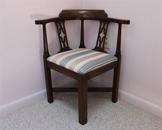 One of a pair of Brandt diminutive corner chairs