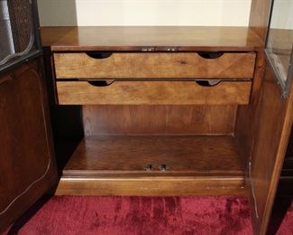 Interior of left side of the large Baker Furniture Company hand carved French Provincial style lighted display cabinet in like new condition