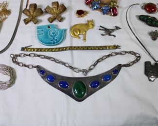 Miriam Haskell earrings at the top left, silver and lapis lazuli and malachite necklace in center