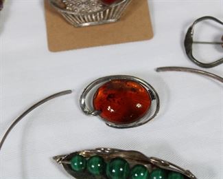 Amber and silver brooch or pin