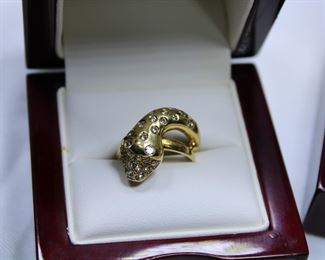 18K yellow gold snake form ring with diamonds