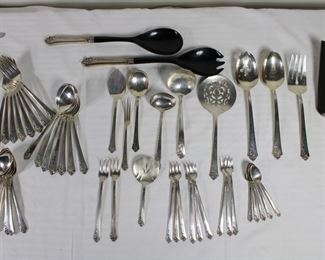 Close ups of the Service for 8 in Oneida's Damask Rose sterling silver pattern, with serving pieces