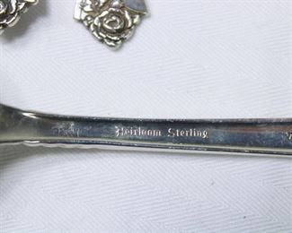 Mark on the Service for 8 in Oneida's Damask Rose sterling silver pattern, with serving pieces