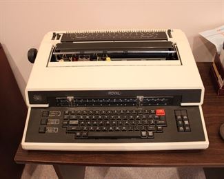 Royal Electric Typewriter, working, with cover and manual.  Multiple extra ribbons available, plus two additional type wheels