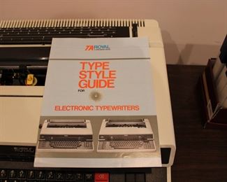 Royal Electric Typewriter, working, with cover and manual.  Multiple extra ribbons available, plus two additional type wheels