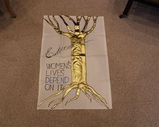 Large banner promoting Education - Women's Lives Depend On It