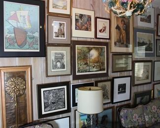 One wall showing a very small portion of the original artworks that are for sale....there are over 100 pieces of original art ranging from small, limited edition prints to oversize oil paintings on canvas...we have something for everyone!