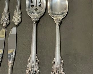 Detail of the Wallace Grand Baroque sterling silver flatware set, five piece place settings, service for 12, plus 7 serving pieces