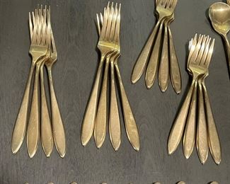 c. 1960's service for eight of Duralite gold colored silverware purchased at Krautheim's Jewelers in Muskegon